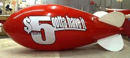 advertising blimp 14ft. - w/o artwork $665.00; with artwork from $1021.00. 100's of blimps in stock!