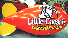 Helium Blimps - Little Caesar's logo - advertising blimps bring business!